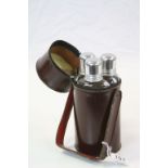 Set of Three Glass Hunting / Spirit Flasks contained in a Cylindrical Leather Case