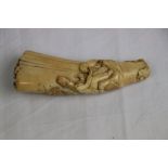 Victorian ivory carved walking stick handle, depicting a seated man with top hat and rifle feeding