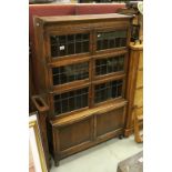 Early 20th century Oak Book Shelf / Cabinet, the Three Upper Sections each with Two Leaded Glazed