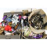 Two boxes of assorted costume jewellery necklaces, bracelets, bangles, jewellery stands, semi-