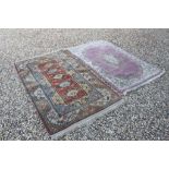 Cream and Blue Ground Wool Rug with Geometric Pattern, 180cms x118cms together with Pink Ground Rug