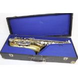 Cased Champion B & M Saxophone with Gilt Finish and White Metal and Mother of Pearl Keys
