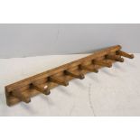 Set of Eight Wooden Coat Tack Room Pegs