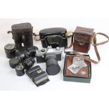 Assorted binoculars, cameras and lenses, to include cased set of Ross London binoculars; Contessa