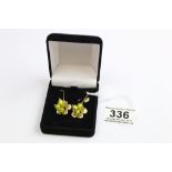 Pair of paste bead 9ct yellow gold drop earrings, a four bead cluster set to 9ct gold flower head