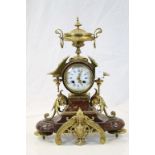 19th century French Rouge Marble and Brass Mantel Clock with 8 day movement
