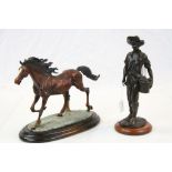 Bronze Effect Figure of a Young Boy carrying apples together with a Resin model of a Horse