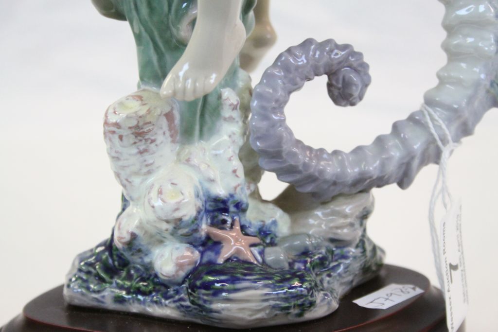 Large Lladro ceramic model "Mermaid on Seahorse", with attached wood effect base, stands approx 32cm - Image 3 of 5