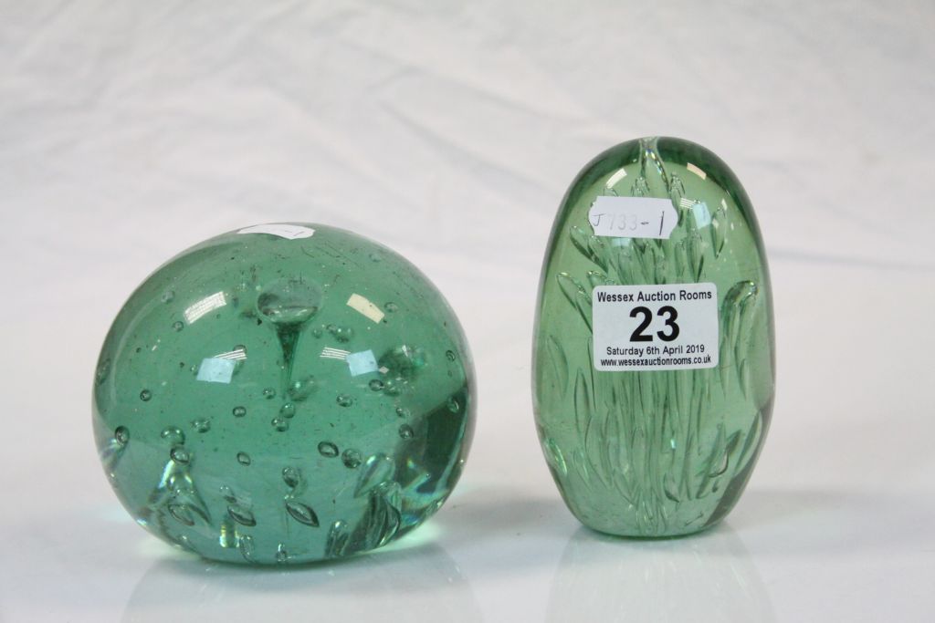 Two 19th Century Green Glass "Dump" Paperweights with air bubble decoration, and rough pontil bases,