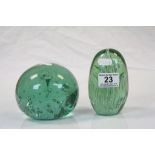 Two 19th Century Green Glass "Dump" Paperweights with air bubble decoration, and rough pontil bases,