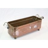 Copper Planter with Brass and Ceramic Handles and Brass Paw Feet, 57cms long together with a Large