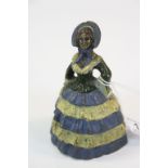 Early 20th century Cold Painted Brass Bell in the form of a Lady in Crinoline Dress with her legs