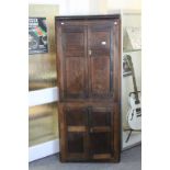 Georgian Oak Corner Cupboard on Cupboard, each section with two panel doors opening to reveal