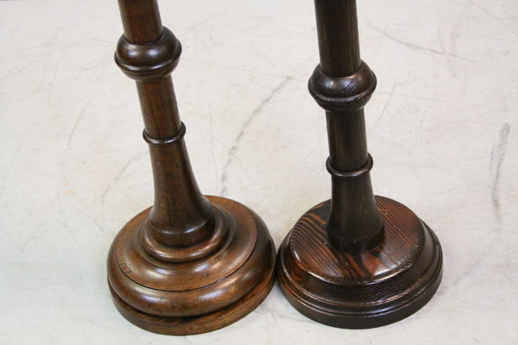 Two similar Oak Standard Candle Stands each set with a Brass Candle Holders and raised on turned - Image 2 of 3