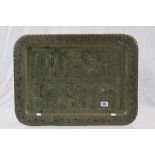 Persian Brass Tray, the relief scene depicting Faravahar and other Zoroastrian Figures, 65cms x
