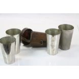 Leather cased set of four Nickel plated stacking Hunting Stirrup cups, maker marked "A & N" to