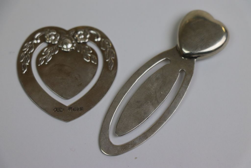 Silver bookmark in the form of a heart with floral decoration in relief, makers Harrison