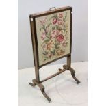 Early 19th century Mahogany Extending Firescreen with Woolwork Floral Panel