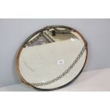 Early 20th century Circular Bevelled Edge Mirror, the copper frame with applied swags, 47cms