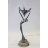 Art Deco Cast Aluminium lamp in the form of a Nude female and on an Octagonal stepped Marble base,
