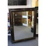 Large Bevelled Edge Wall Mirror contained in a Gilt and Ebonised Effect Frame, 116cms x 147cms