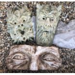 Two Garden Reconstitiuted Stone ' Green Man ' Face Masks together with another Face Mask