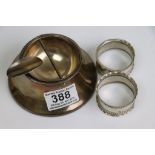 Pair of silver napkin rings together with a silver table ash tray, makers Wilmot Manufacturing
