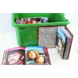 Collection of The Beatles Monthly Books from the 1980s onwards in 7 official folders