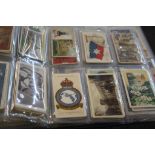 Three folders and a small collection of Albums of vintage Cigarette cards etc to include; Churchman,