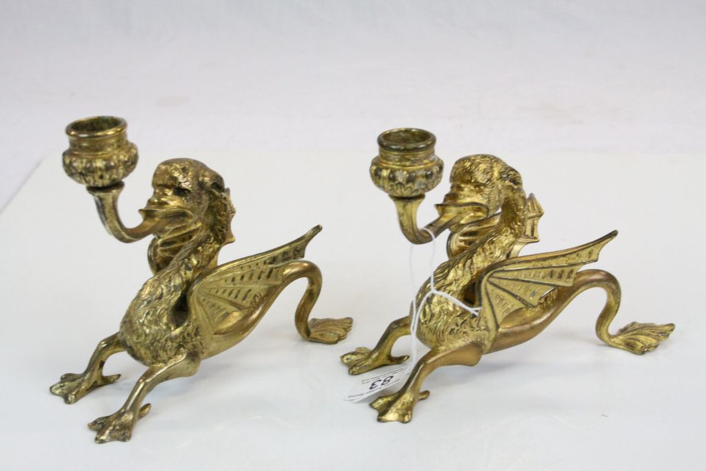 Pair of Brass Candlesticks in the form of Mythical Griffins
