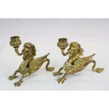 Pair of Brass Candlesticks in the form of Mythical Griffins