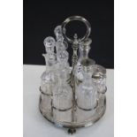 Late 19th century Six Bottle Condiment Set held on a Silver Plated Stand