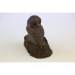 Cast metal model of an Owl on tree stump with Mouse beneath, with Bronzed finish and standing