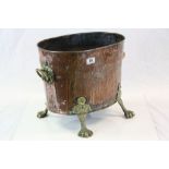 Antique Copper Log Bucket with Brass Lion Mask Ring Handles and Four Brass Paw Feet, 36cms high