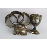 Two Hallmarked Silver Napkin Rings, a Filigree pair and a Hallmarked Silver Egg cup dated 1911