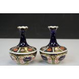 Pair of Royal Crown Derby Imari Small Bottle Neck Vases, pattern no. 1335 / 1128. 11.5cms high