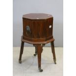 George III Style Mahogany Octagonal Wine Cooler with Brass Lion Mask Handles and raised on Square