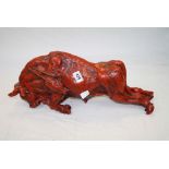 Red Sculpture of a Raging Bull