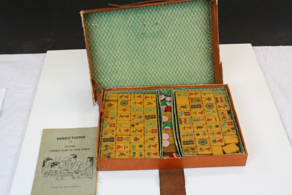 Vintage cased Mah Jong game with early plastic pieces plus instructions, case approx 32 x 23 x 4.