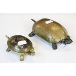 Two vintage wind up Desktop Bells modelled as Tortoises in Brass & Metal, the larger example