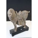Terracotta model of an Oriental style Horse on painted base, measures approx 50 x 44 x 11.5cm at the