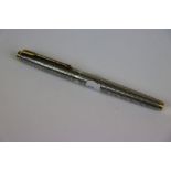 Vintage Parker Fountain Pen in Sterling Silver with 14k Gold nib, approx 12.75cm long with cap on