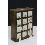 Hardwood Table Top Spice Cabinet with Twelve Ceramic Spice Drawers, some with herb labels