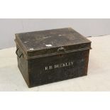 A vintage metal box containing a quantity of tools