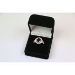 Silver CZ and central paneled amethyst dress ring