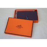 Purple Leather Clutch Bag / Wallet contained in a Box marked Hermes, Paris