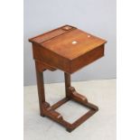 Victorian Style Wooden Child's Desk with Sloping Hinged Writing Surface and inkwell compartment