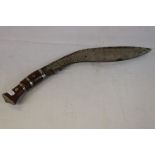 A Vintage Full Size Kukri Knife With Wooden Handle.