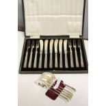 Boxed set of six Fruit knives & forks with Hallmarked Silver handles plus five Hallmarked Silver
