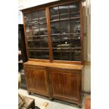 Victorian Mahogany Library Bookcase, the upper section with two glazed doors opening to reveal